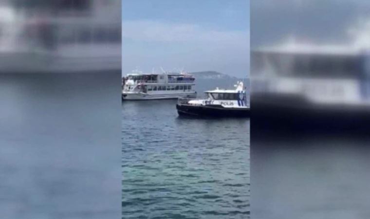 Polis tekneyi iskeleye yanaştırmadı, denize atlayıp barikatı aştı